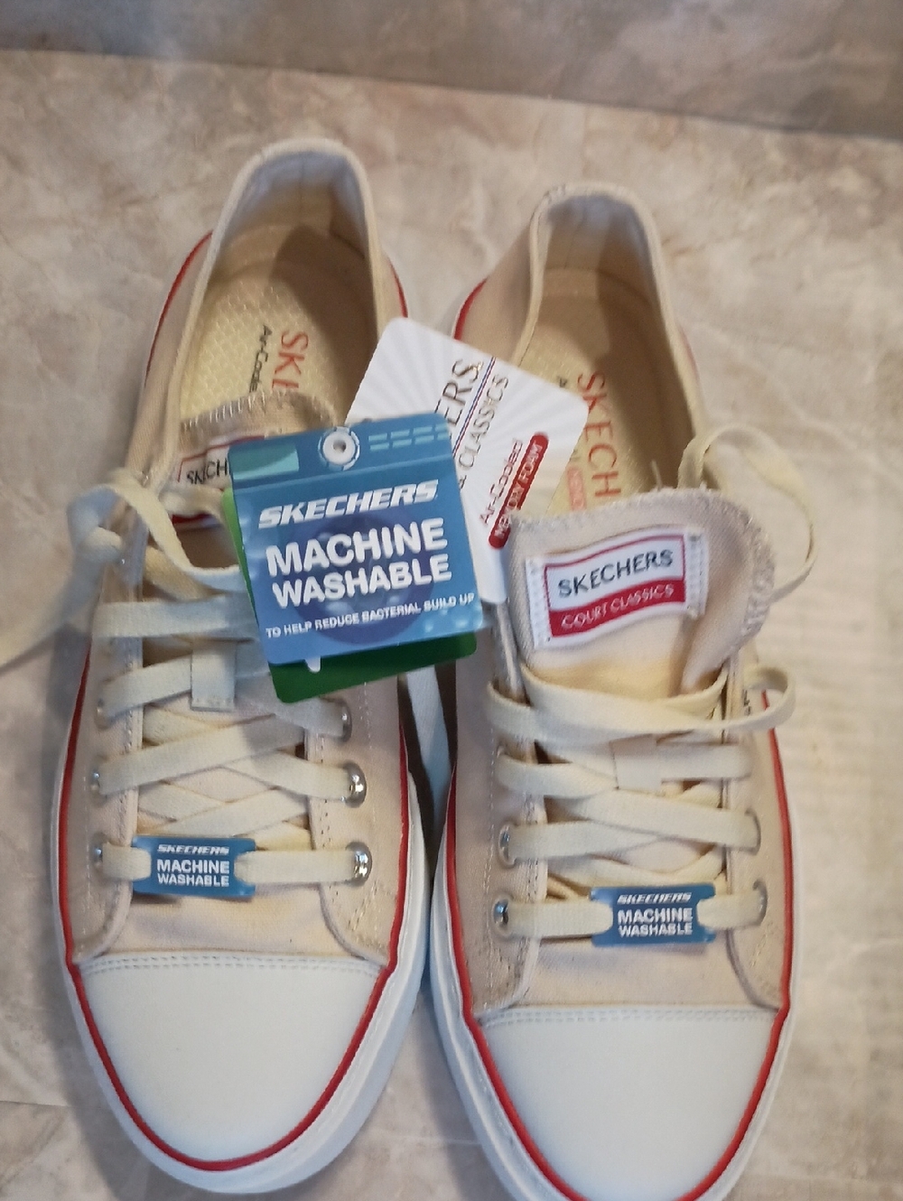Skechers Low Top Sneakers in Cream with Red Accent